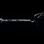 side view photo of black dslr camera